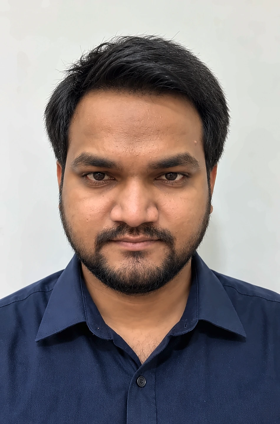 Sandeep Kumar Pulipati in a navy shirt